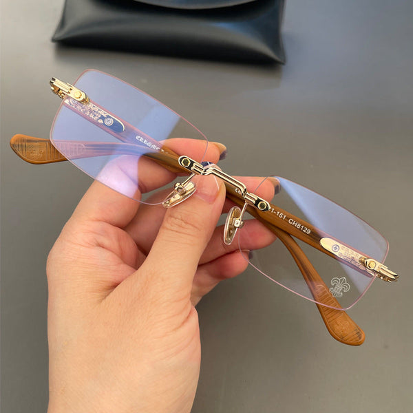 chrome hearts retro frameless perforated thick legs glasses